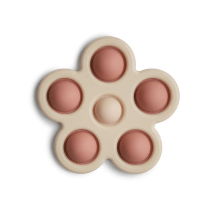 Mushie Activiteitenspeeltje bloemetje Press Toy