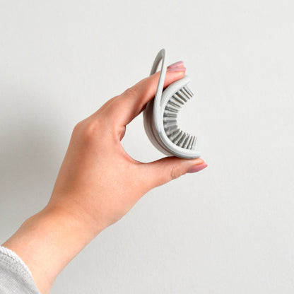 Shnuggle Brosse pour bébé en silicone gris