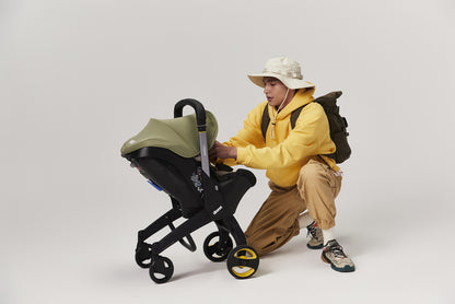 Doona Siège-auto portable transformable Infant Desert Green Groupe 0+