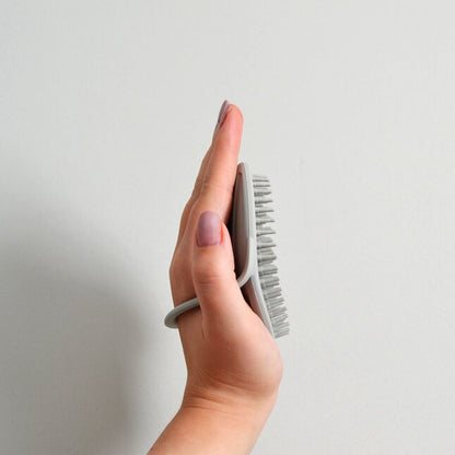 Shnuggle Brosse pour bébé en silicone gris