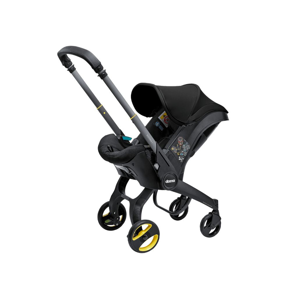 Doona Siège-auto portable transformable Infant Groupe 0+ Nitro Black + base isofix