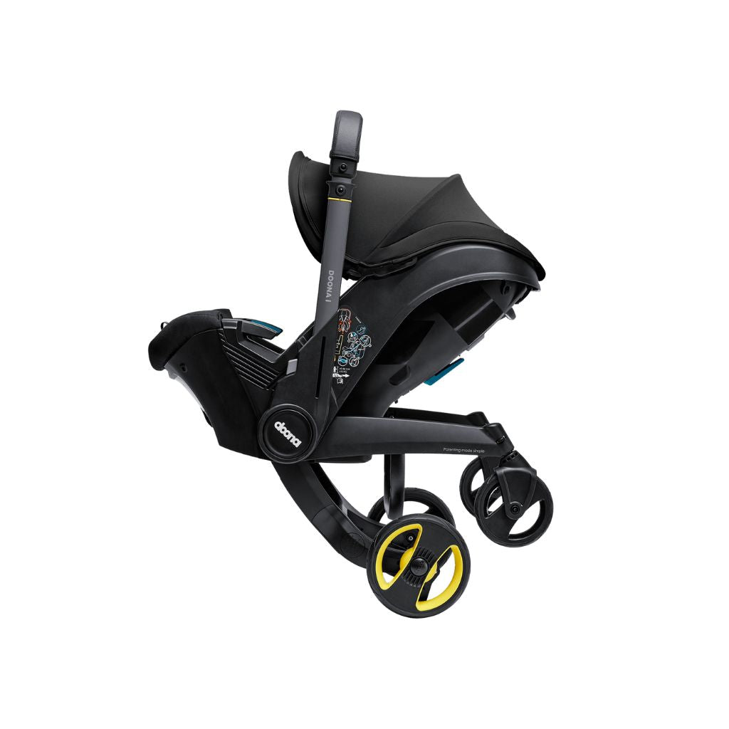 Doona Siège-auto portable transformable Infant Groupe 0+ Nitro Black + base isofix