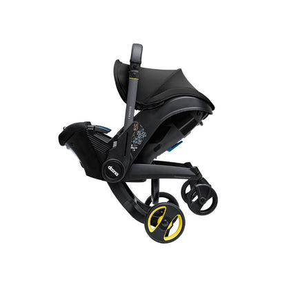 Doona Siège-auto portable transformable Infant Groupe 0+ Nitro Black + base isofix